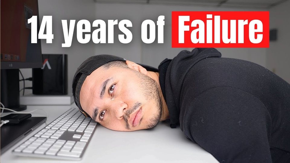 Ramon with his head on his keyboard, from his video about 14 years of failing at YouTube